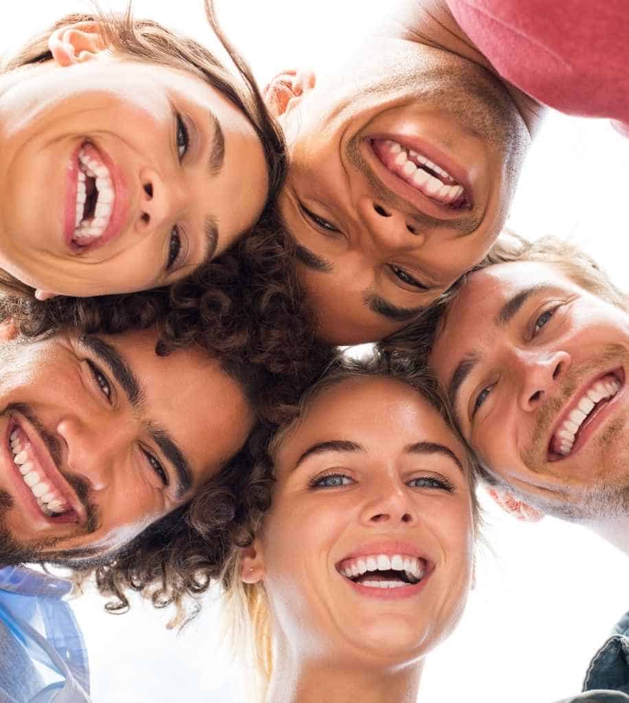 Smiling person showcasing white teeth after laser whitening treatment Dartford